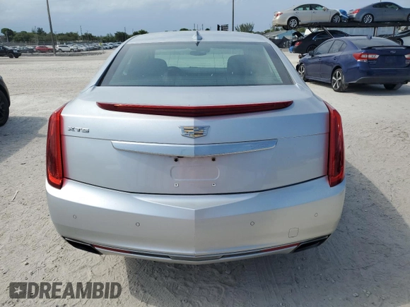 2016 Cadillac XTS Luxury Collection z VIN 2G61M5S30G9104763, wystawiony jako Copart lot #56464505 z przebiegiem 54 309 mil mil oraz Szkoda całkowita • Salvage title. Historia ofert i sprzedaży dostępna na DreamBid. Obrazek 6.