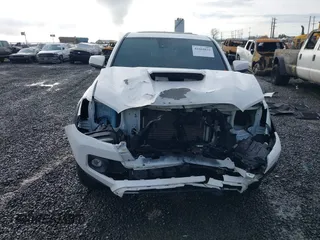 2021 Toyota Tacoma SR z VIN 3TMCZ5AN2MM426723, wystawiony jako IAAI lot #41604033 z przebiegiem 46 522 mil mil oraz . Historia ofert i sprzedaży dostępna na DreamBid. Obrazek 13.