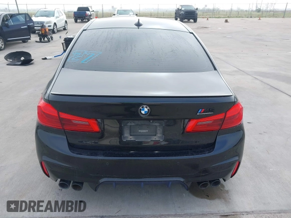 2019 BMW M5 z VIN WBSJF0C51KB447804, wystawiony jako IAAI lot #41848760 z przebiegiem 83 303 mil mil oraz . Historia ofert i sprzedaży dostępna na DreamBid. Obrazek 16.