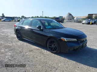 2023 Honda Civic Sport z VIN 2HGFE2F53PH508982, wystawiony jako IAAI lot #42073180 z przebiegiem 18 523 mil mil oraz . Historia ofert i sprzedaży dostępna na DreamBid. Obrazek 1.