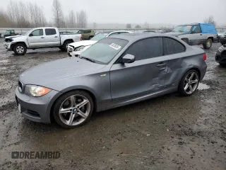 2010 BMW 1 Series 135i with VIN WBAUC7C53AVK96433, listed as a Copart auction lot 86206304 with 48,553 mi miles and Salvage Title. Bid and sale history available at carsss.com. Image 1.