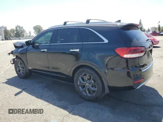2016 Kia Sorento SXL z VIN 5XYPKDA19GG016449, wystawiony jako Copart lot #56943845 z przebiegiem 72 350 mil mil oraz Szkoda całkowita • Salvage title. Historia ofert i sprzedaży dostępna na DreamBid. Obrazek 2.