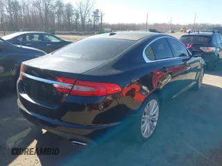 2012 Jaguar XF Portfolio with VIN SAJWA0HB5CLS40694, listed as a IAAI auction lot 41820189 with 1 mi miles. Bid and sale history available at carsss.com. Image 4.