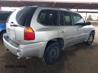 2004 GMC Envoy SLT with VIN 1GKDS13S942267554, listed as a IAAI auction lot 41754066 with 178,895 mi miles. Bid and sale history available at carsss.com. Image 4.