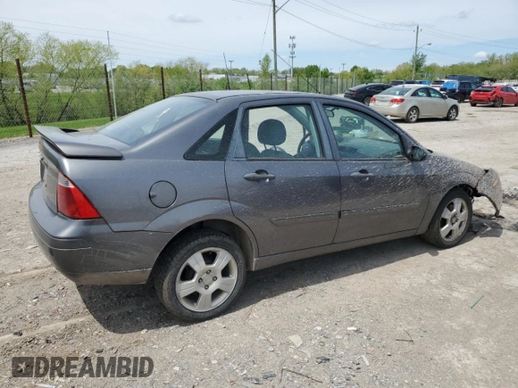 2007 Ford Focus S z VIN 1FAHP34N17W103625, wystawiony jako Copart lot #55300395 z przebiegiem 82 041 mil mil oraz Szkoda całkowita • Salvage title. Historia ofert i sprzedaży dostępna na DreamBid. Obrazek 3.