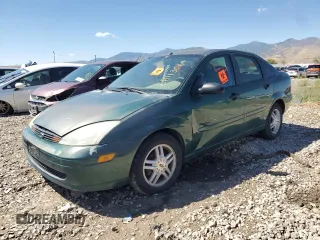 2001 Ford Focus SE with VIN 1FAFP34P91W163877, listed as a Copart auction lot 87327184 with Not Provided miles and Salvage Title. Bid and sale history available at carsss.com. Image 1.