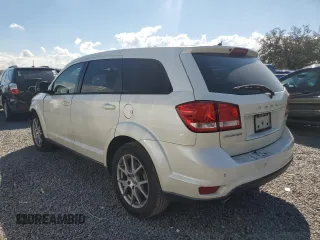 2013 Dodge Journey R/T with VIN 3C4PDCEG7DT646980, listed as a Copart auction lot 47174905 with 226,972 mi miles and Salvage title. Bid and sale history available at DreamBid. Image 2.