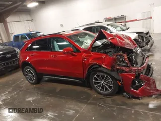 2024 Cadillac XT4 AWD Sport z VIN 1GYFZFR42RF154352, wystawiony jako IAAI lot #41249916 z przebiegiem 27 378 mil mil oraz . Historia ofert i sprzedaży dostępna na DreamBid. Obrazek 13.