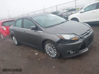2012 Ford Focus Titanium with VIN 1FAHP3J2XCL480248, listed as a IAAI auction lot 41858332 with 150,167 mi miles. Bid and sale history available at carsss.com. Image 1.