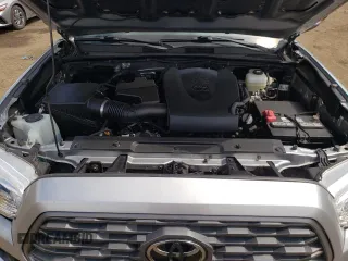 2021 Toyota Tacoma SR z VIN 5TFCZ5AN7MX272231, wystawiony jako Copart lot #52739255 z przebiegiem 67 414 mil mil oraz Szkoda całkowita • Salvage title. Historia ofert i sprzedaży dostępna na DreamBid. Obrazek 11.