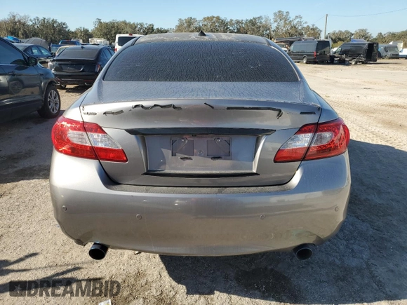 2013 Infiniti M37 with VIN JN1BY1AR9DM604703, listed as a Copart auction lot 77650014 with 104,675 mi miles and Salvage Title. Bid and sale history available at carsss.com. Image 6.