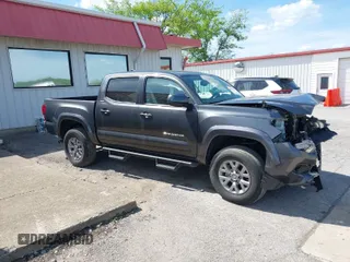 2018 Toyota Tacoma SR5 with VIN 3TMAZ5CN9JM070187, listed as a IAAI auction lot 41816520 with 43,068 mi miles and . Bid and sale history available at DreamBid. Image 1.
