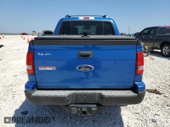 2010 Ford Explorer Sport Trac XLT z VIN 1FMEU3BE4AUF04190, wystawiony jako Copart lot #51857205 z przebiegiem 91 112 mil mil oraz Szkody całkowita. Historia ofert i sprzedaży dostępna na DreamBid. Obrazek 6.