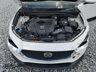 2021 Mazda CX-30 Premium z VIN 3MVDMADM5MM228747, wystawiony jako Copart lot #51747475 z przebiegiem 13 562 mil mil oraz Nie do naprawy • Non repairable. Historia ofert i sprzedaży dostępna na DreamBid. Obrazek 12.