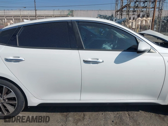 2016 Kia Optima SX Turbo with VIN 5XXGW4L2XGG043934, listed as a IAAI auction lot 40451940 with 86,386 mi miles and . Bid and sale history available at carsss.com. Image 13.