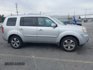 2015 Honda Pilot EX-L with VIN 5FNYF3H68FB001256, listed as a IAAI auction lot 42028966 with 277,927 mi miles and . Bid and sale history available at carsss.com. Image 13.