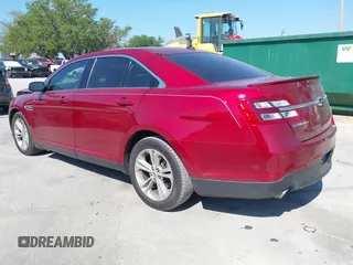 2014 Ford Taurus SEL with VIN 1FAHP2E86EG186642, listed as a IAAI auction lot 41901768 with 106,057 mi miles. Bid and sale history available at carsss.com. Image 3.