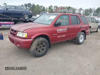 2004 Isuzu Rodeo S z VIN 4S2CK58W644317345, wystawiony jako IAAI lot #41940961 z przebiegiem Nie podano mil oraz . Historia ofert i sprzedaży dostępna na DreamBid. Obrazek 2.
