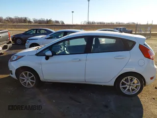 2019 Ford Fiesta SE z VIN 3FADP4EJ0KM148306, wystawiony jako IAAI lot #41666170 z przebiegiem 68 966 mil mil oraz . Historia ofert i sprzedaży dostępna na DreamBid. Obrazek 14.