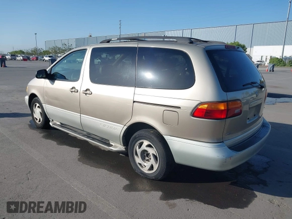 2000 Toyota Sienna LE with VIN 4T3ZF13C9YU189305, listed as a IAAI auction lot 42201168 with 218,254 mi miles and . Bid and sale history available at DreamBid. Image 3.