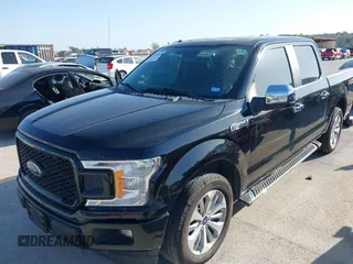 2018 Ford F-150 XL with VIN 1FTEW1C58JKC02382, listed as a IAAI auction lot 42010568 with 124,757 mi miles and . Bid and sale history available at DreamBid. Image 2.