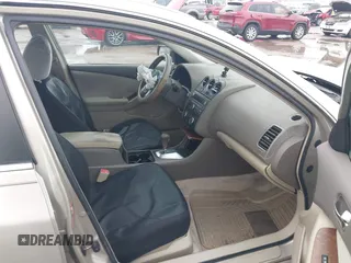 2009 Nissan Altima 2.5 S with VIN 1N4AL21E19N529707, listed as a IAAI auction lot 41959465 with 137,497 mi miles. Bid and sale history available at carsss.com. Image 5.