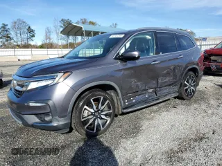 2019 Honda Pilot Touring 8-Passenger with VIN 5FNYF5H97KB002138, listed as a Copart auction lot 82107254 with 82,838 mi miles and Salvage Title. Bid and sale history available at carsss.com. Image 1.