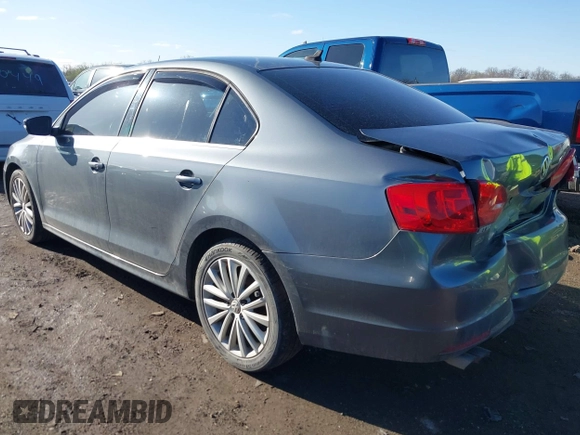2014 Volkswagen Jetta TDI w/Premium with VIN 3VW3L7AJ9EM383295, listed as a IAAI auction lot 41983218 with 105,077 mi miles and . Bid and sale history available at DreamBid. Image 3.