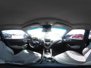 2012 Hyundai Veloster w/Black Int with VIN KMHTC6AD0CU056828, listed as a IAAI auction lot 42611623 with 136,242 mi miles and . Bid and sale history available at DreamBid. Image 19.
