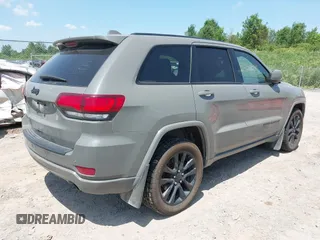 2020 Jeep Grand Cherokee Laredo E with VIN 1C4RJFAG0LC293050, listed as a IAAI auction lot 42566345 with 64,960 mi miles and . Bid and sale history available at DreamBid. Image 4.