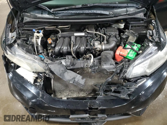 2015 Honda Fit EX-L z VIN 3HGGK5H88FM721318, wystawiony jako Copart lot #56717255 z przebiegiem 107 235 mil mil oraz Szkoda całkowita • Salvage title. Historia ofert i sprzedaży dostępna na DreamBid. Obrazek 12.