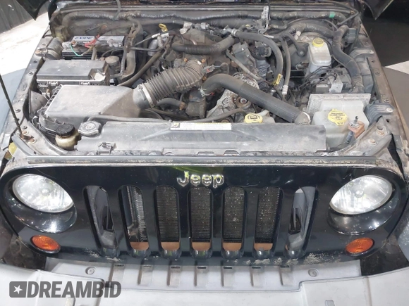2009 Jeep Wrangler Unlimited Rubicon z VIN 1J8GA69109L738914, wystawiony jako IAAI lot #40379001 z przebiegiem 120 153 mil mil oraz . Historia ofert i sprzedaży dostępna na DreamBid. Obrazek 10.