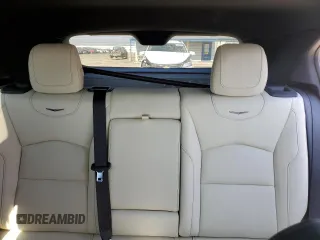 2021 Cadillac XT4 AWD Sport with VIN 1GYFZFR43MF032608, listed as a Copart auction lot 74906524 with 55,751 mi miles and Salvage title. Bid and sale history available at DreamBid. Image 10.