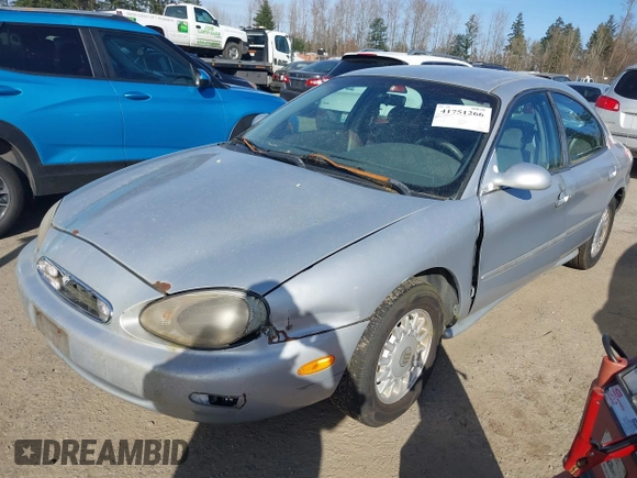 1996 Mercury Sable GS with VIN 1MELM50U5TG605997, listed as a IAAI auction lot 41751266 with 179,662 mi miles. Bid and sale history available at carsss.com. Image 2.