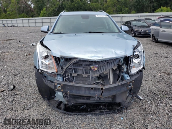 2011 Cadillac SRX Premium Collection with VIN 3GYFNFEY3BS585014, listed as a Copart auction lot 63872065 with 140,680 mi miles and Salvage title. Bid and sale history available at DreamBid. Image 5.