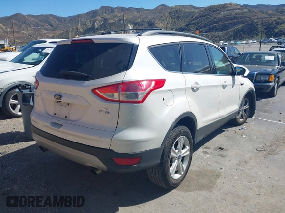 2014 Ford Escape SE with VIN 1FMCU9GX5EUB53378, listed as a IAAI auction lot 41709382 with Not provided miles and . Bid and sale history available at DreamBid. Image 4.