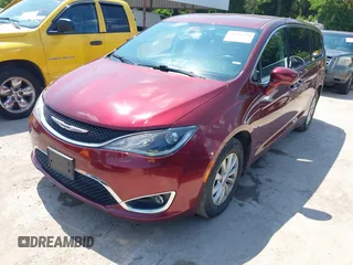 2019 Chrysler Pacifica Touring Plus z VIN 2C4RC1FGXKR706264, wystawiony jako IAAI lot #42416570 z przebiegiem 86 897 mil mil oraz . Historia ofert i sprzedaży dostępna na DreamBid. Obrazek 2.