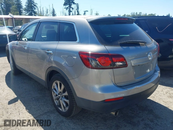 2014 Mazda CX-9 Grand Touring with VIN JM3TB2DA9E0435295, listed as a IAAI auction lot 42618683 with 177,783 mi miles and . Bid and sale history available at DreamBid. Image 3.