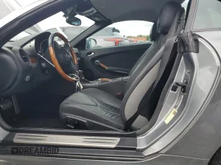 2010 Mercedes-Benz SLK with VIN WDBWK5JA7AF228325, listed as a Copart auction lot 55966235 with 41,728 mi miles and Salvage title. Bid and sale history available at DreamBid. Image 7.