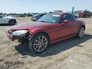 2011 Mazda MX-5 Miata Club z VIN JM1NC2MF2B0214479, wystawiony jako Copart lot #59026075 z przebiegiem 87 840 mil mil oraz Szkoda całkowita • Salvage title. Historia ofert i sprzedaży dostępna na DreamBid. Obrazek 1.