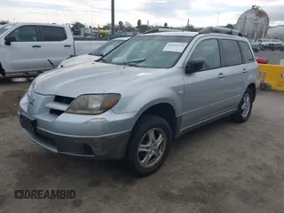 2004 Mitsubishi Outlander LS with VIN JA4LX31F04U038009, listed as a IAAI auction lot 41616254 with 219,527 mi miles. Bid and sale history available at carsss.com. Image 2.