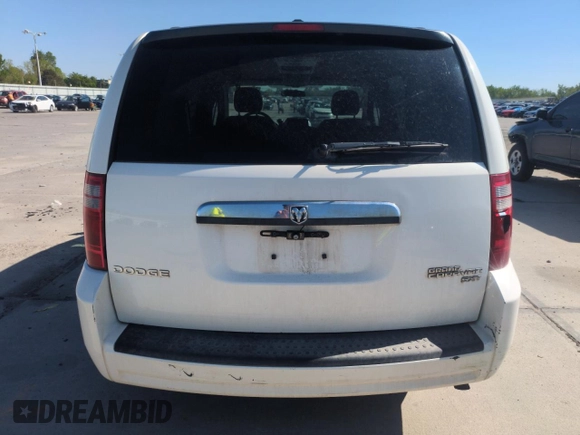 2010 Dodge Grand Caravan SXT with VIN 2D4RN5D16AR444938, listed as a Copart auction lot 56762695 with 251,437 mi miles and Clean Title. Bid and sale history available at DreamBid. Image 6.