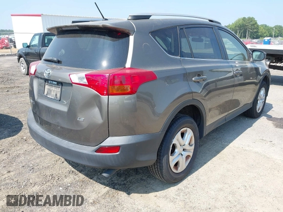 2014 Toyota RAV4 LE with VIN JTMZFREVXED034316, listed as a IAAI auction lot 42610135 with 214,871 mi miles and . Bid and sale history available at DreamBid. Image 4.