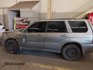 2007 Subaru Forester X w/Premium Pkg with VIN JF1SG65657H719525, listed as a IAAI auction lot 41696437 with 217,895 mi miles. Bid and sale history available at carsss.com. Image 14.