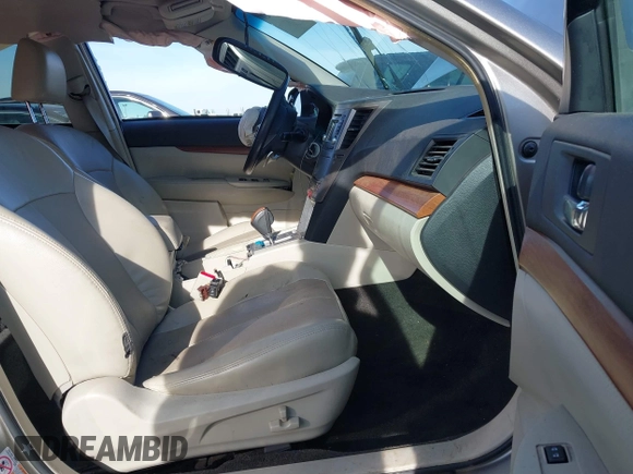 2014 Subaru Outback Limited with VIN 4S4BRBLC7E3325536, listed as a IAAI auction lot 41209727 with 128,758 mi miles and . Bid and sale history available at DreamBid. Image 5.