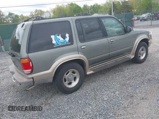 1999 Ford Explorer XLT z VIN 1FMZU35P9XZB75917, wystawiony jako IAAI lot #42132762 z przebiegiem 189 946 mil mil oraz . Historia ofert i sprzedaży dostępna na DreamBid. Obrazek 4.