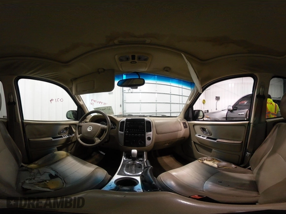 2006 Mercury Mariner Luxury с VIN 4M2YU57116DJ03832, выставлен на аукционе IAAI как лот 41790719 с пробегом 161 978 миль миль и . История ставок и продаж доступна на DreamBid. Изображение 22.
