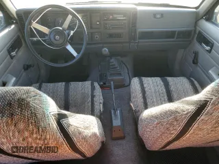 1993 Jeep Cherokee SE with VIN 1J4FJ28S0PL594889, listed as a Copart auction lot 50103425 with 174,333 mi miles and Salvage Title. Bid and sale history available at carsss.com. Image 8.