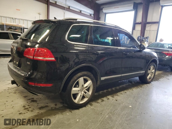 2011 Volkswagen Touareg Exec with VIN WVGFK9BP8BD003948, listed as a Copart auction lot 48285065 with 152,497 mi miles and Salvage Title. Bid and sale history available at DreamBid. Image 3.