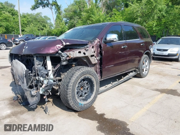 2012 Dodge Durango Citadel with VIN 1C4SDHET1CC275636, listed as a IAAI auction lot 42266742 with 212,030 mi miles and . Bid and sale history available at DreamBid. Image 2.